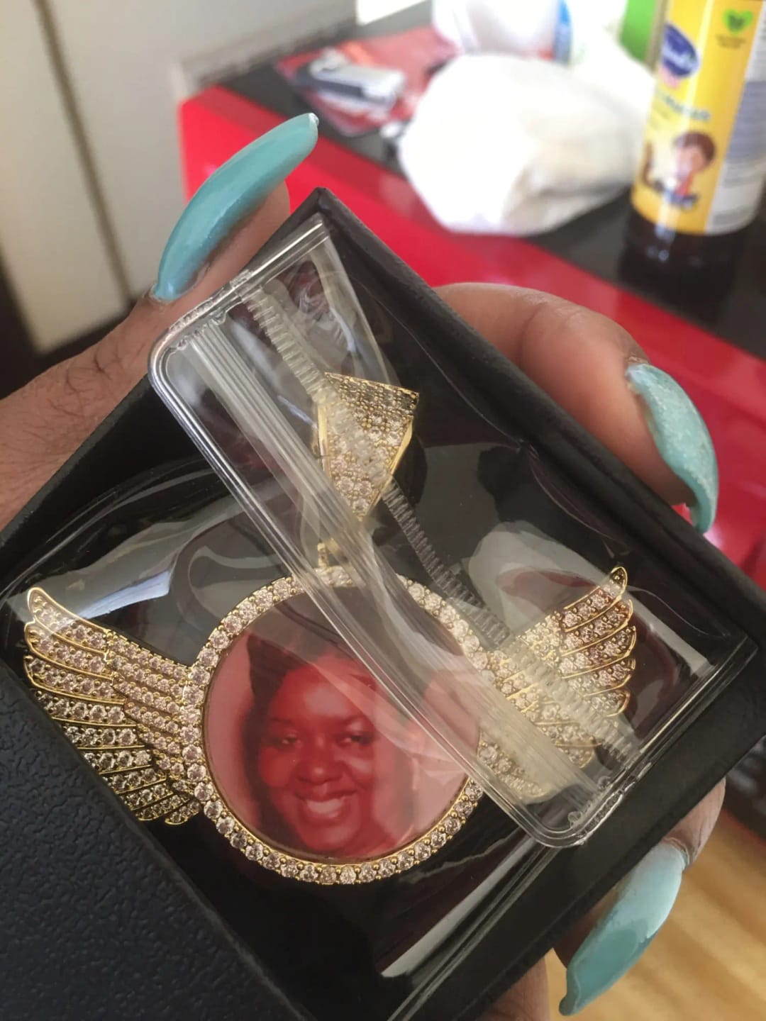 Customer photo review of Angel Wing Photo Necklace With Picture Inside – Custom Personalized Pendant
