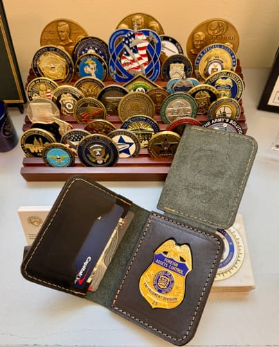 Customer's open leather Federal Badge Wallet showing a recessed law enforcement badge and card slots.