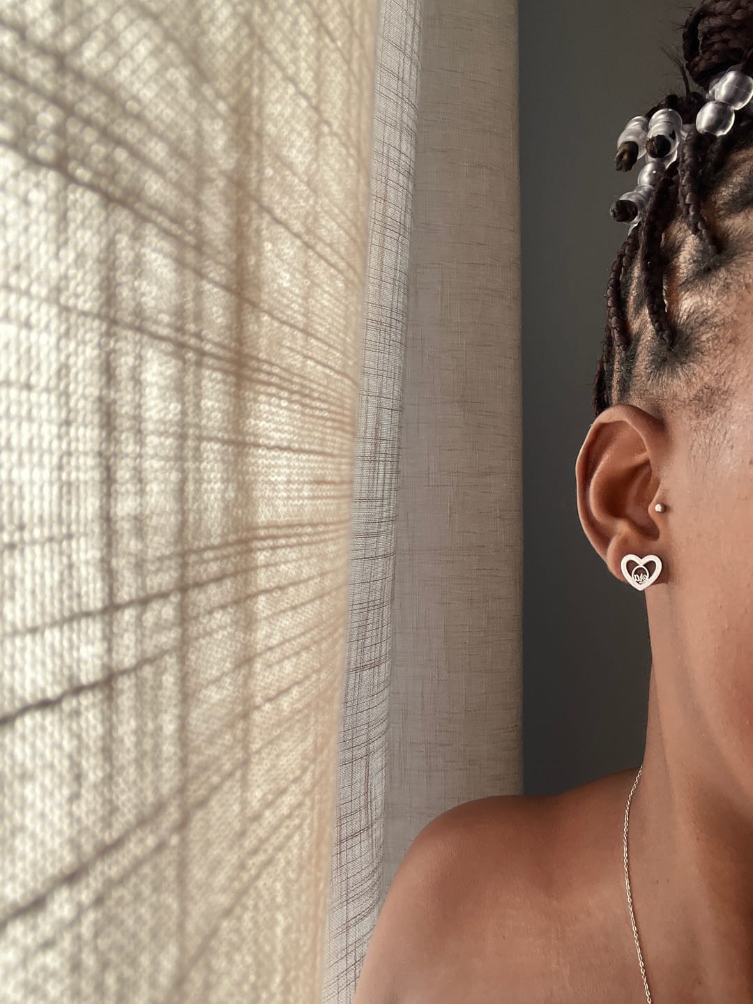 Customer photo review of Silver Thando Studs