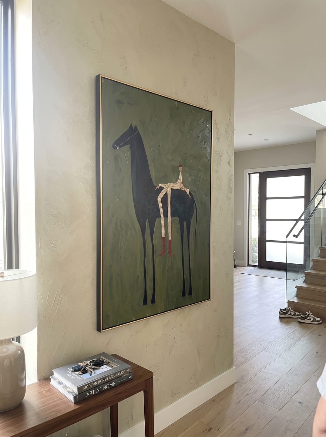 Customer photo review of The Solitary Dreamer – Surrealistic Black Horse & Red Boots Painting | Modern Minimalist Living Room Art