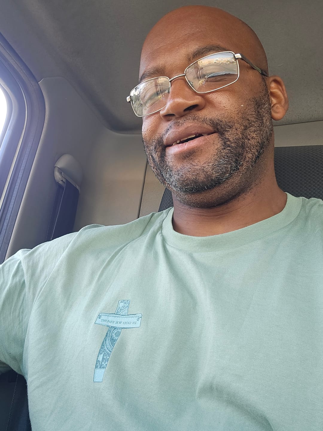Customer photo review of In God We Trust Shirt