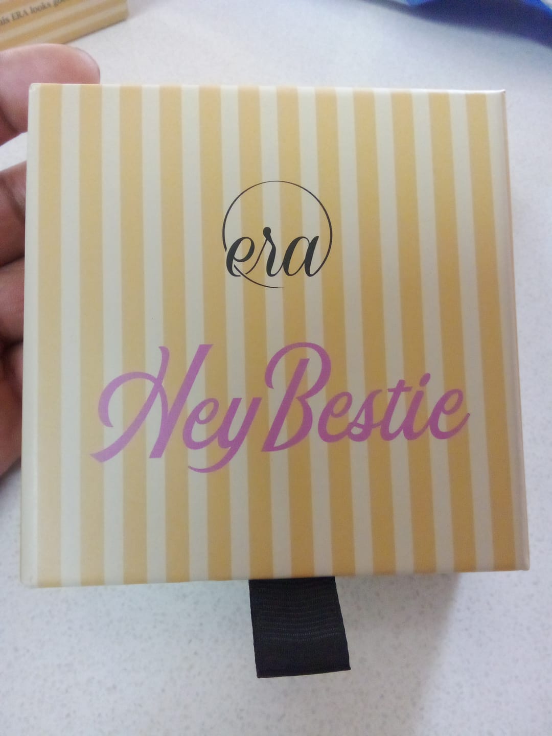 Customer photo review of Silver Precious Logo Earrings