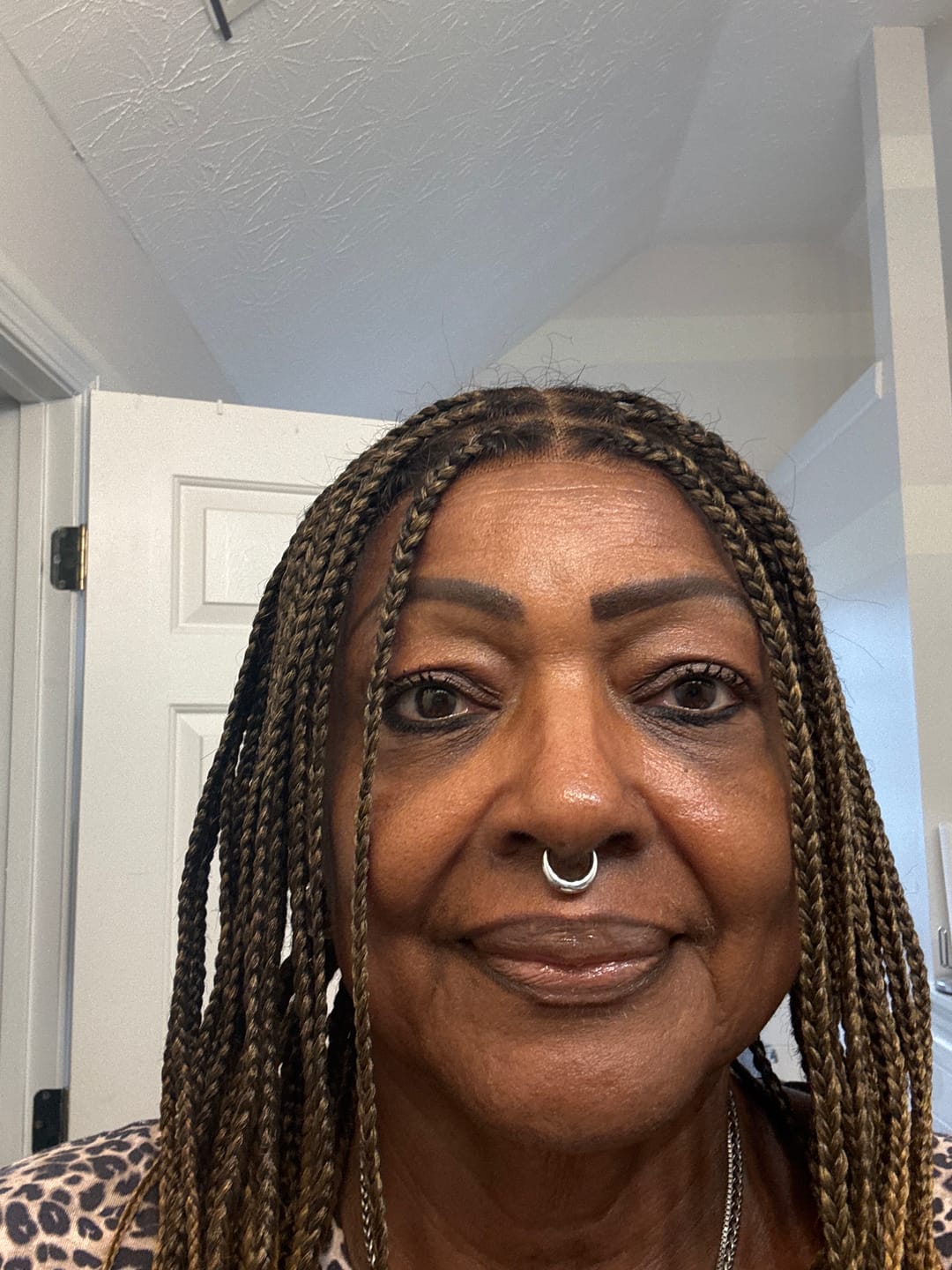 Customer photo review of Kora - Pre Bleached Human Hair Lace Lightweight Knotless Swiss HD Lace Box Braided Wig 100 Strands