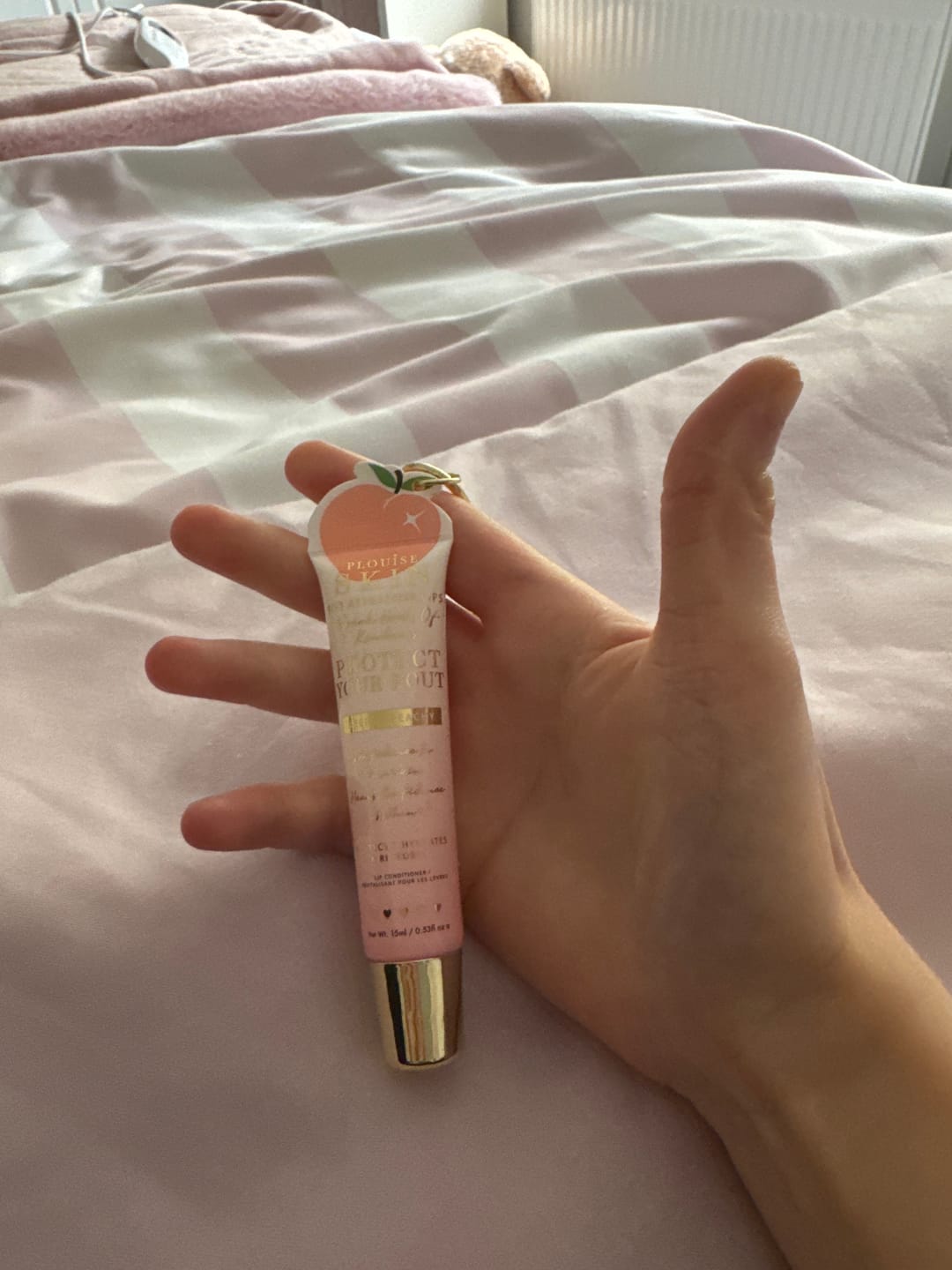 Vásárlói fotóértékelés a Protect Your Pout kulcstartó ajakápolóról
