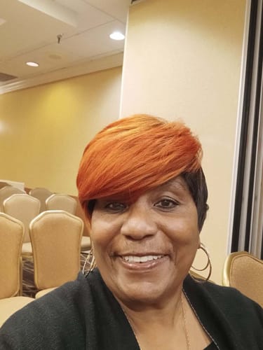 A customer submitted this smiling selfie with their review.