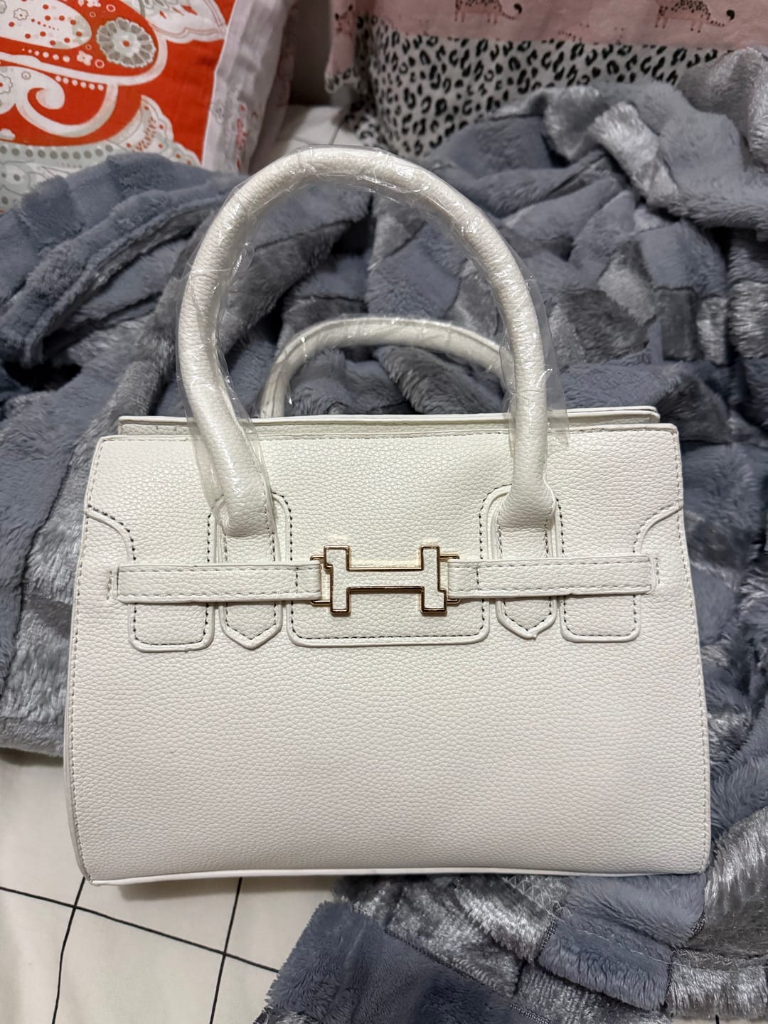 Customer photo review of Signature Lock Satchel