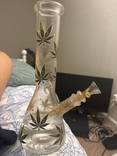 Customer's Turn On Your Hemp Lights Beaker Bong with hemp leaf decals, showing recent use.