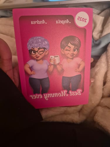 Customer holding a personalized Besties Forever Pink Acrylic Block. It shows two winking cartoon women and mirrored text.
