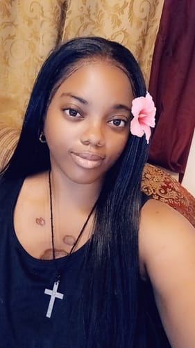 Customer wearing the natural-looking, long Shake N Go Snatched 360 wig.