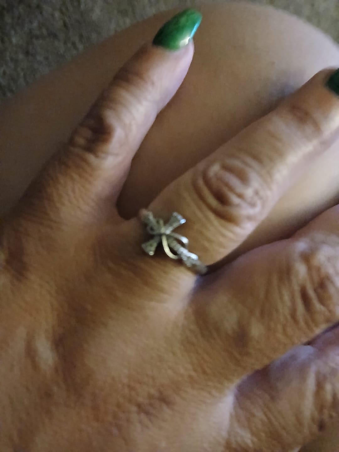 Customer photo review of Christianartworkshop Golden/Silver Mobius Cross Ring: Carry His Grace in Daily Wear