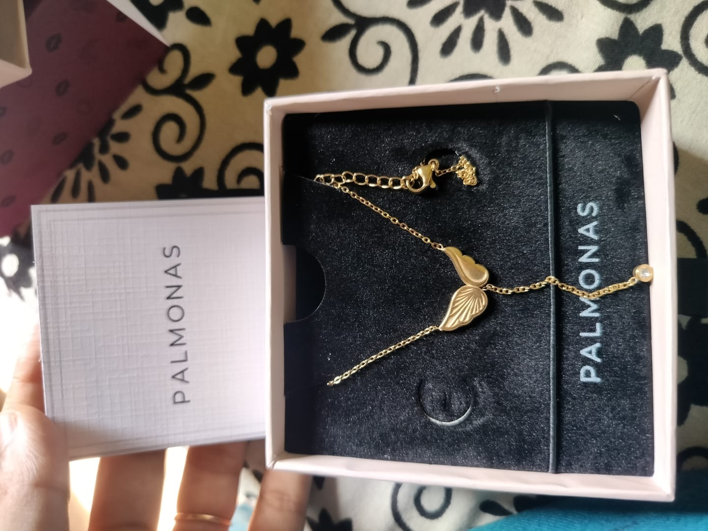 Customer photo review of Angel Wing Dangling Diamond Necklace
