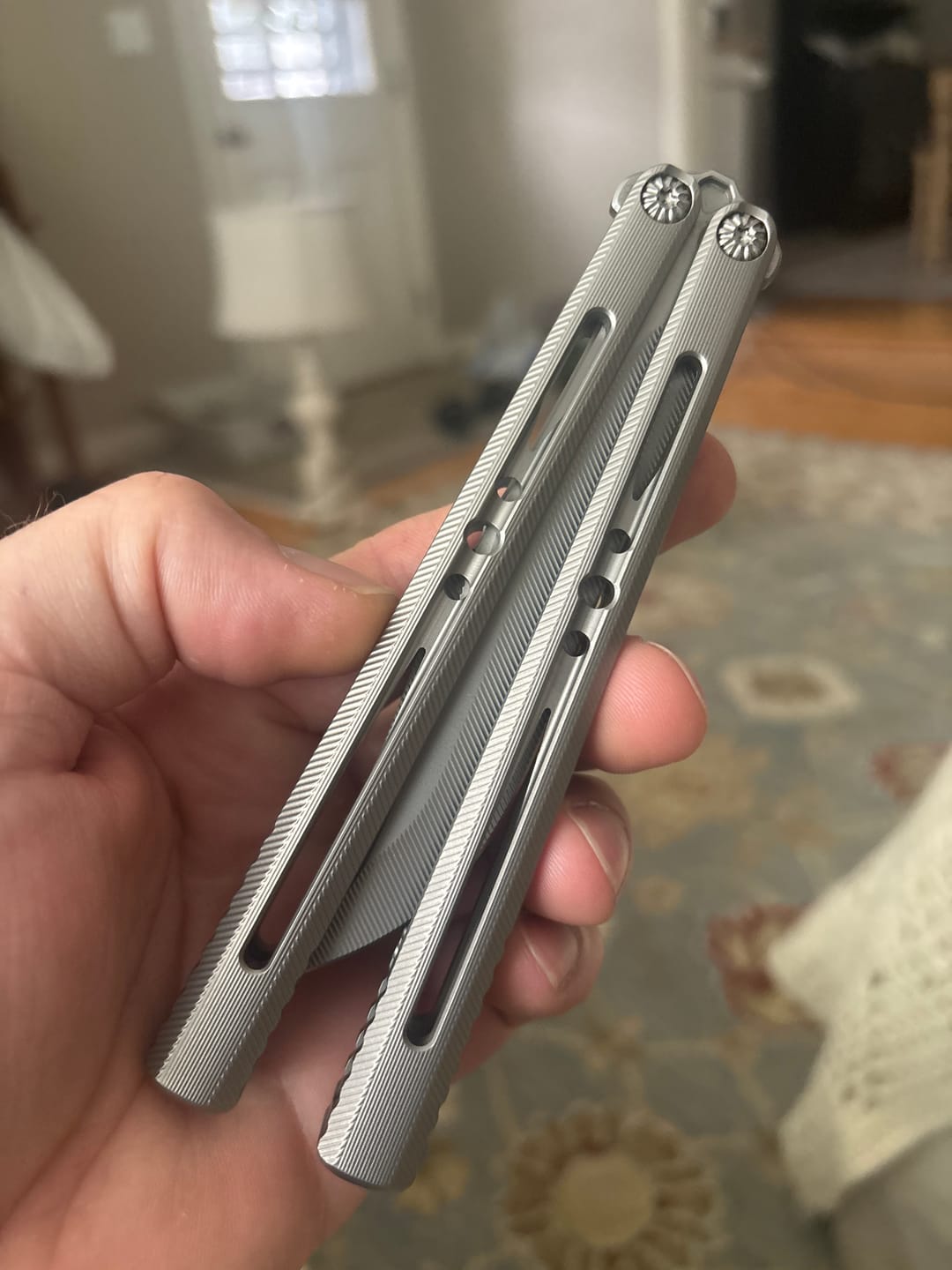 Customer photo review of APOCALYPSE TIANQI Titanium Vixen V2 Balisong Clone Titanium Alloy Handle Stainless Steel Blade Bushing