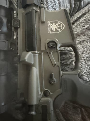 Customer's AR-15 with the AS Designs ARC Fire Trigger installed, showing the selector on the dark green receiver.