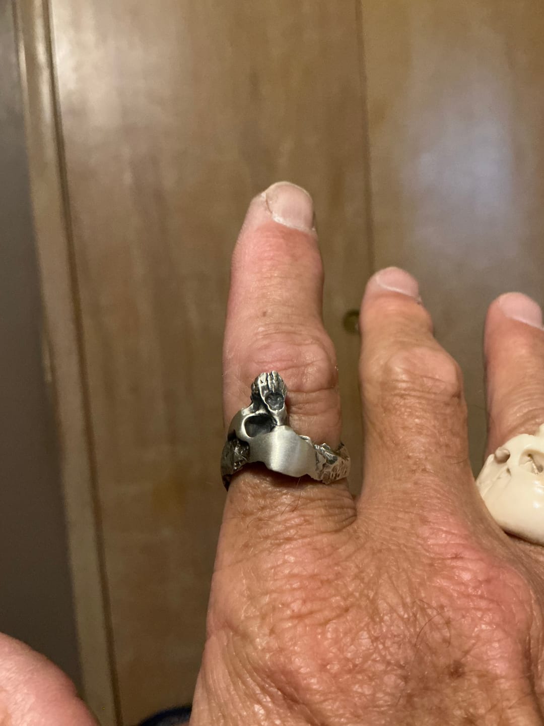 Customer photo review of Wounded Skull Head Ring
