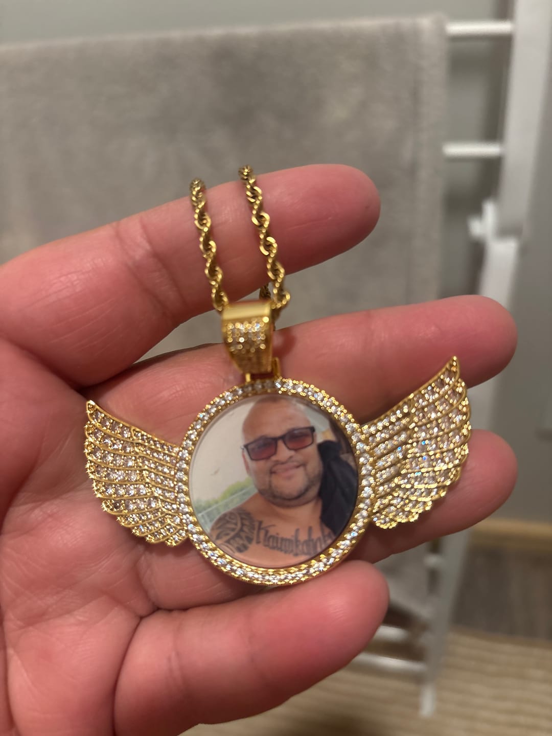 Customer photo review of Diamond Studded Angel Wing Photo Necklace