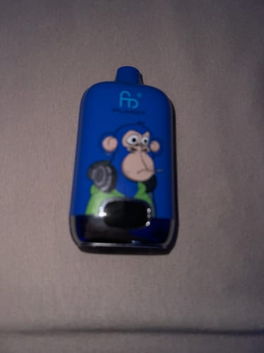 Customer's blue RAndM Digital Box 12000 vape with a cartoon monkey design.