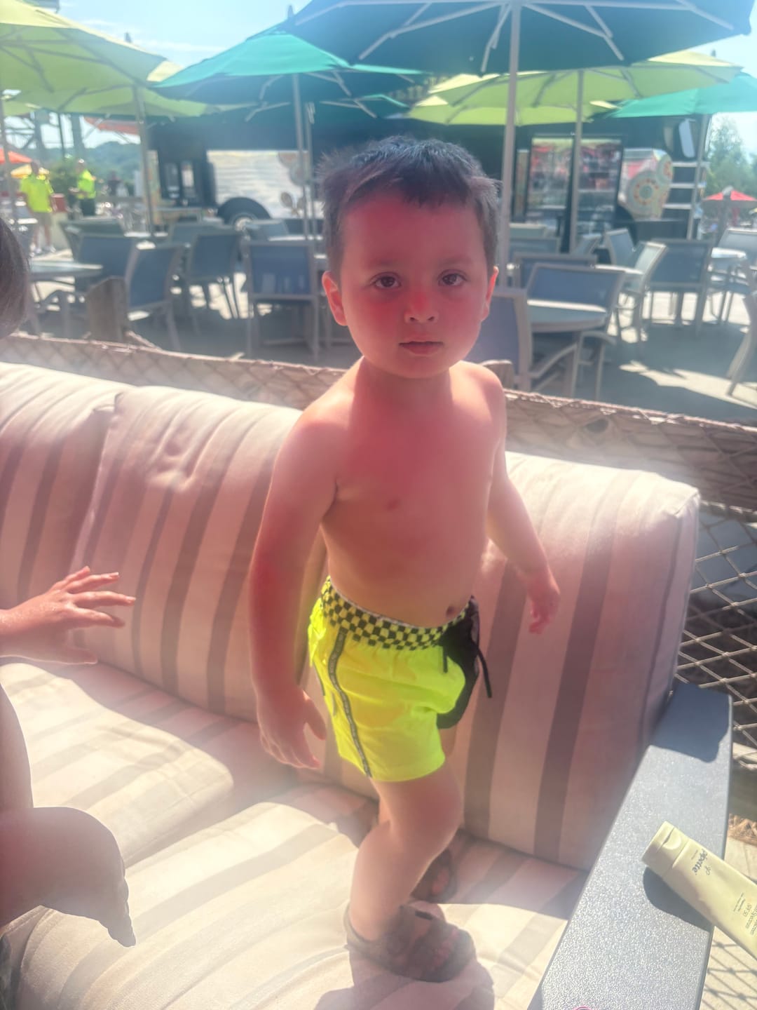 Customer photo review of Hybrid Swim Trunks in Neon Electric Lime + Black Colorblock
