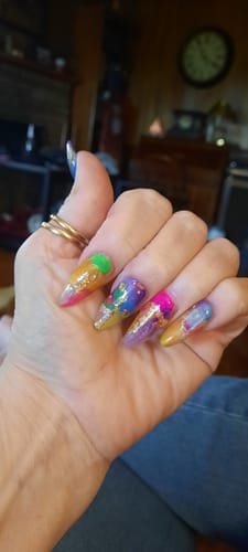 Customer photo review of Gotti No Wipe Gel Top Coat - Super Slick - New and Improved Formula (GOLD BOTTLE)