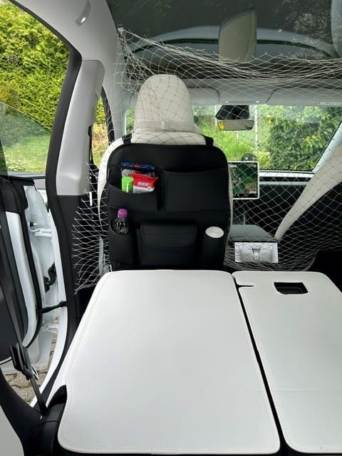 Customer photo review of Model 3/Y/S/X Car Seat Back Storage Bag Hanging Bag Multifunctional Storage Box For Tesla (1 Pc)