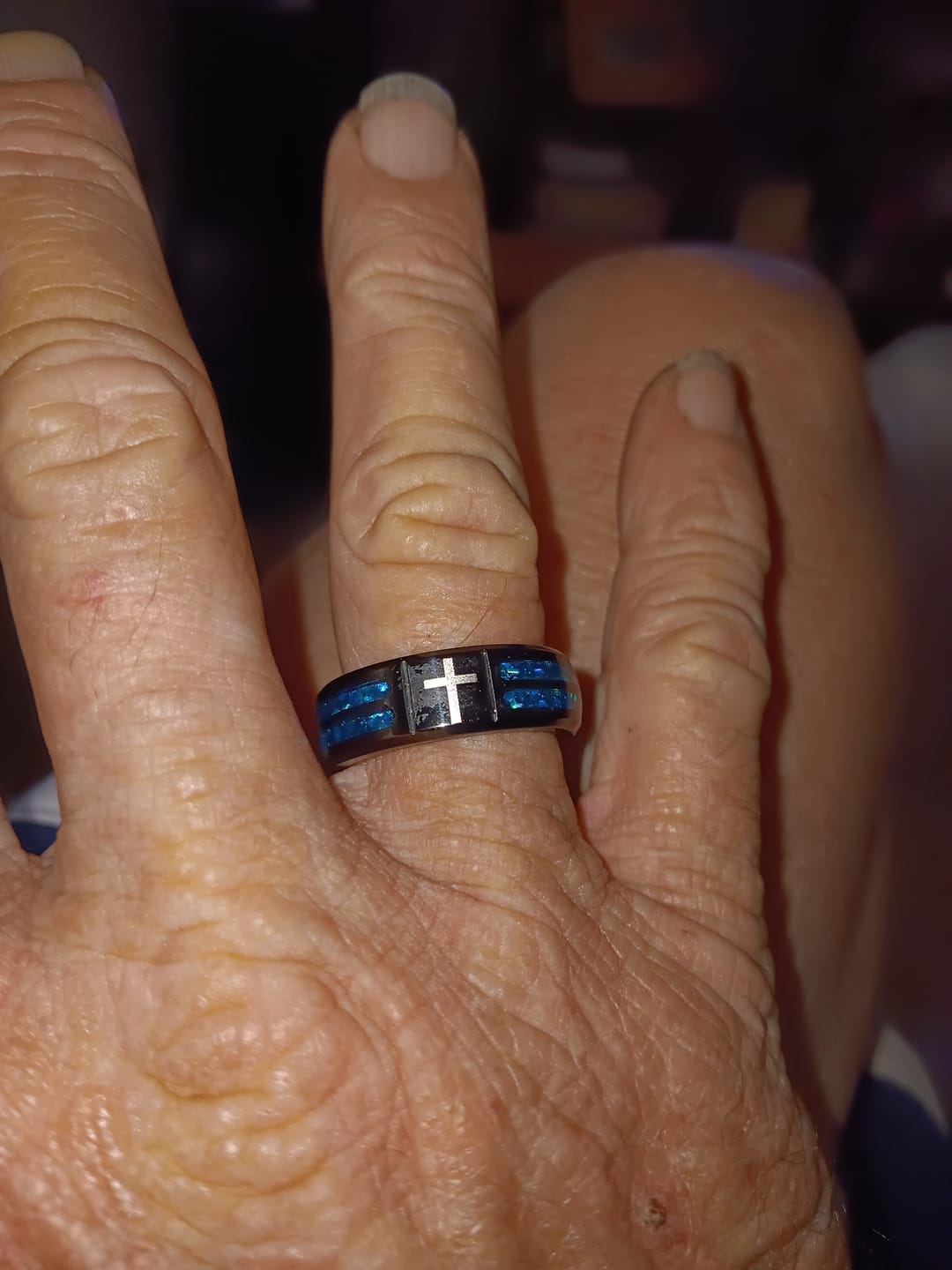 Customer photo review of Christianartworkshop Modern Titanium Steel Cross Ring with Laser Blue Inlay: Serenity in Christ's Blue Light