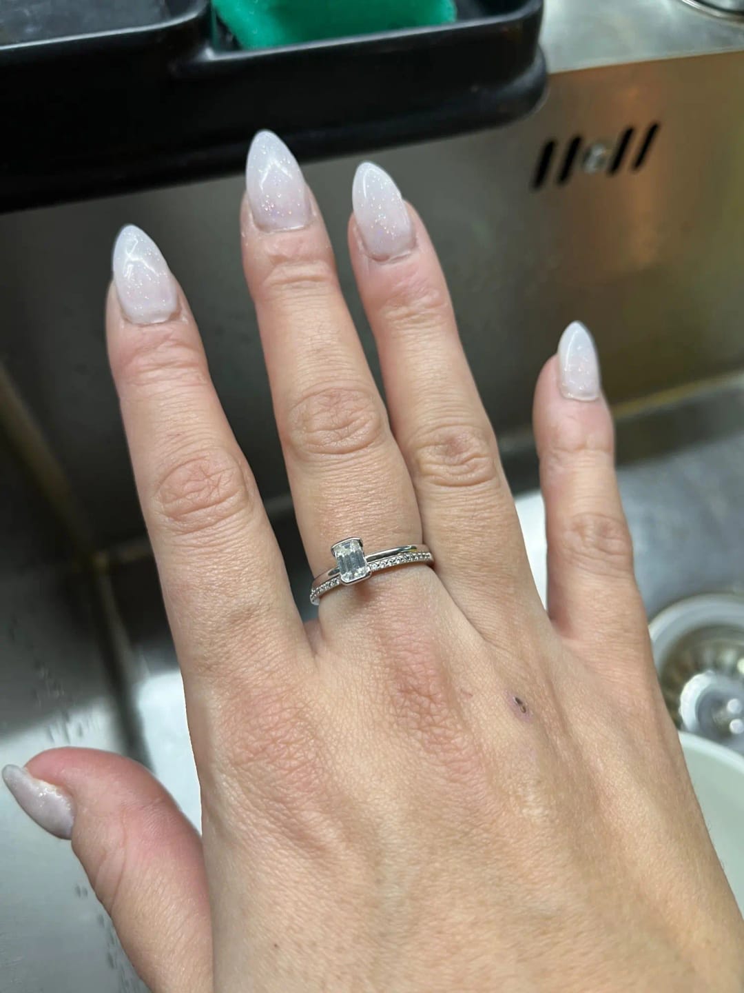 Customer photo review of Petite Emerald Cut Moissanite Ring
