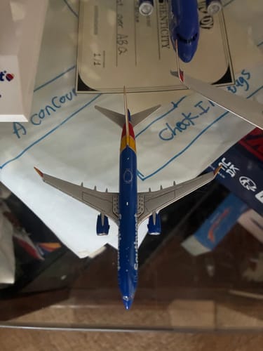 Customer's overhead view of the blue GEMINI SOUTHWEST 737MAX8 model airplane, showing the detailed wings and colorful tail.