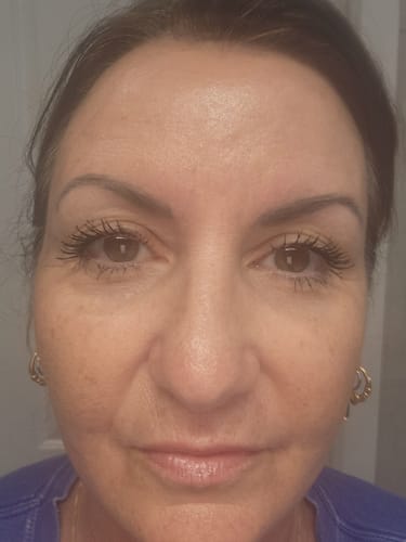 Close-up of a reviewer showing long, full lashes after applying My Amazing Lashes Mascara.