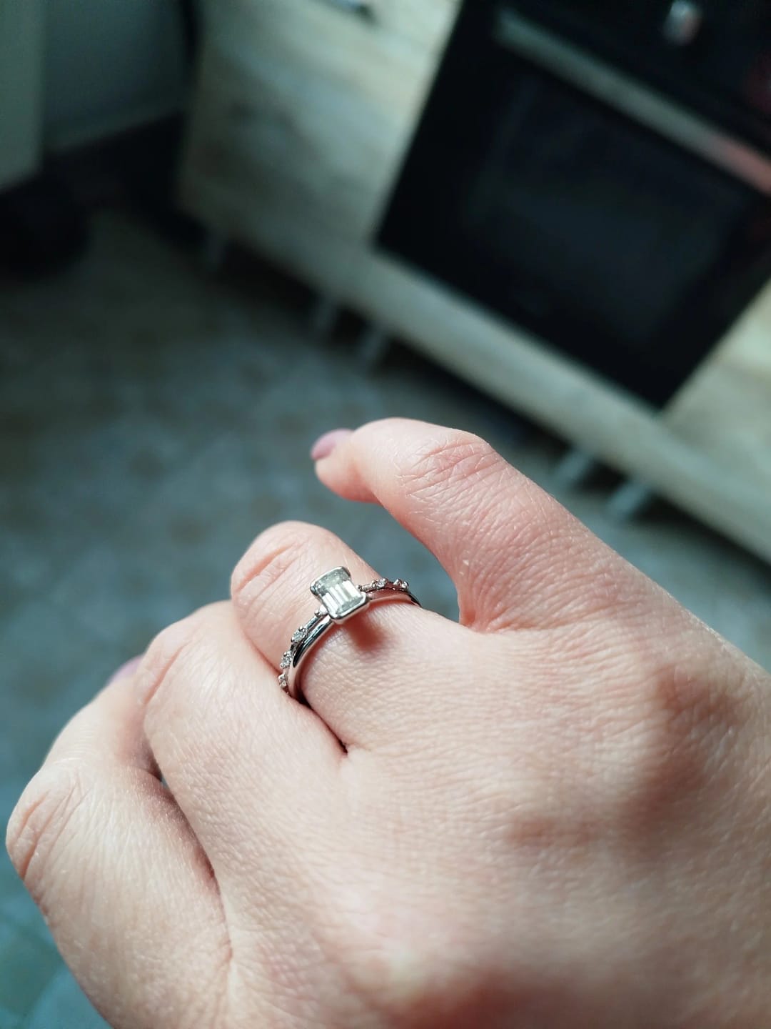 Customer photo review of Petite Emerald Cut Moissanite Ring
