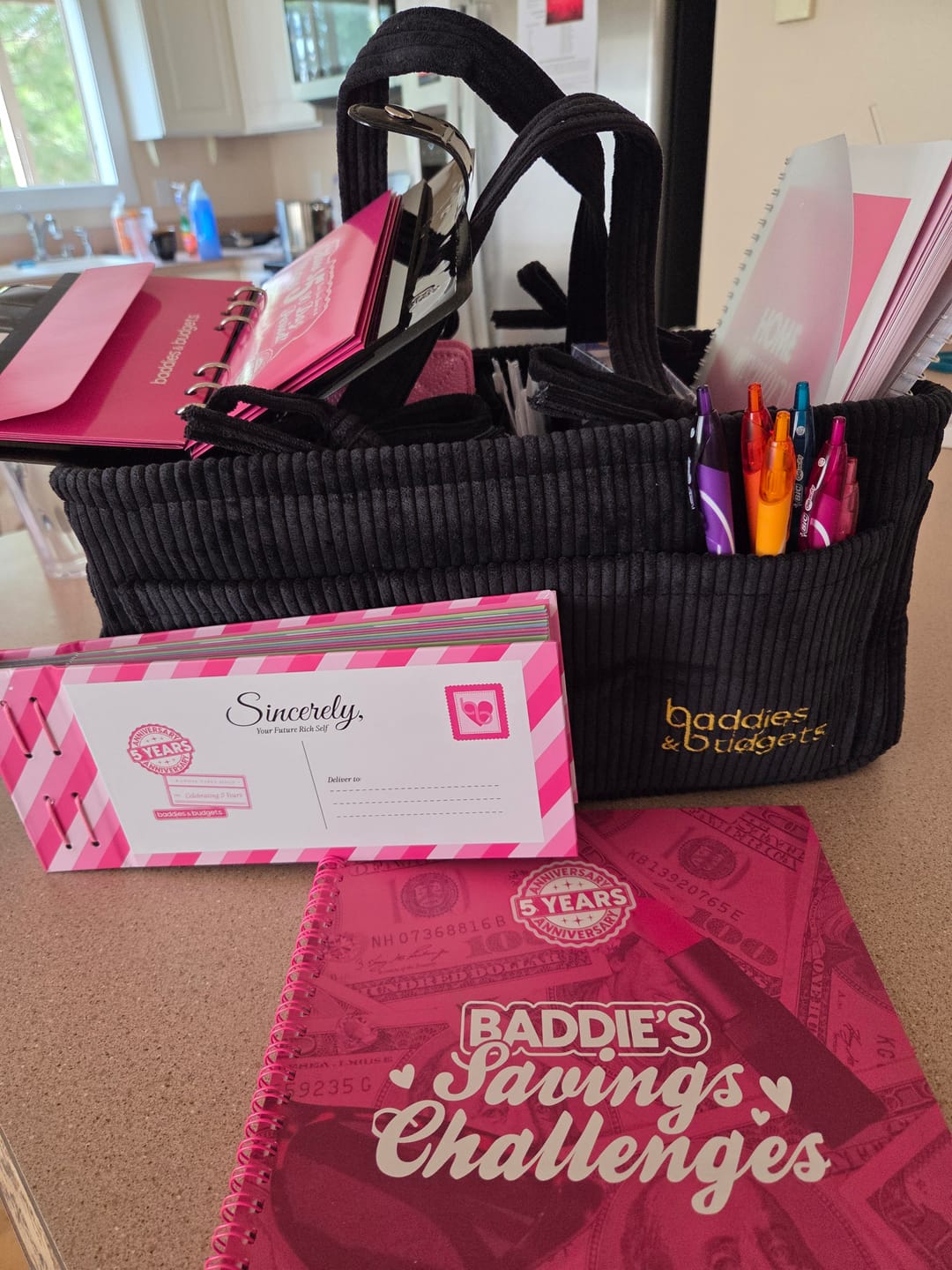 Customer photo review of Baddies & Budgets 5th Anniversary Limited Edition Box