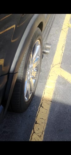 Close-up of a customer's wheel after installing the Hubcentric Wheel Spacers, showing the tire poking out from the fender.