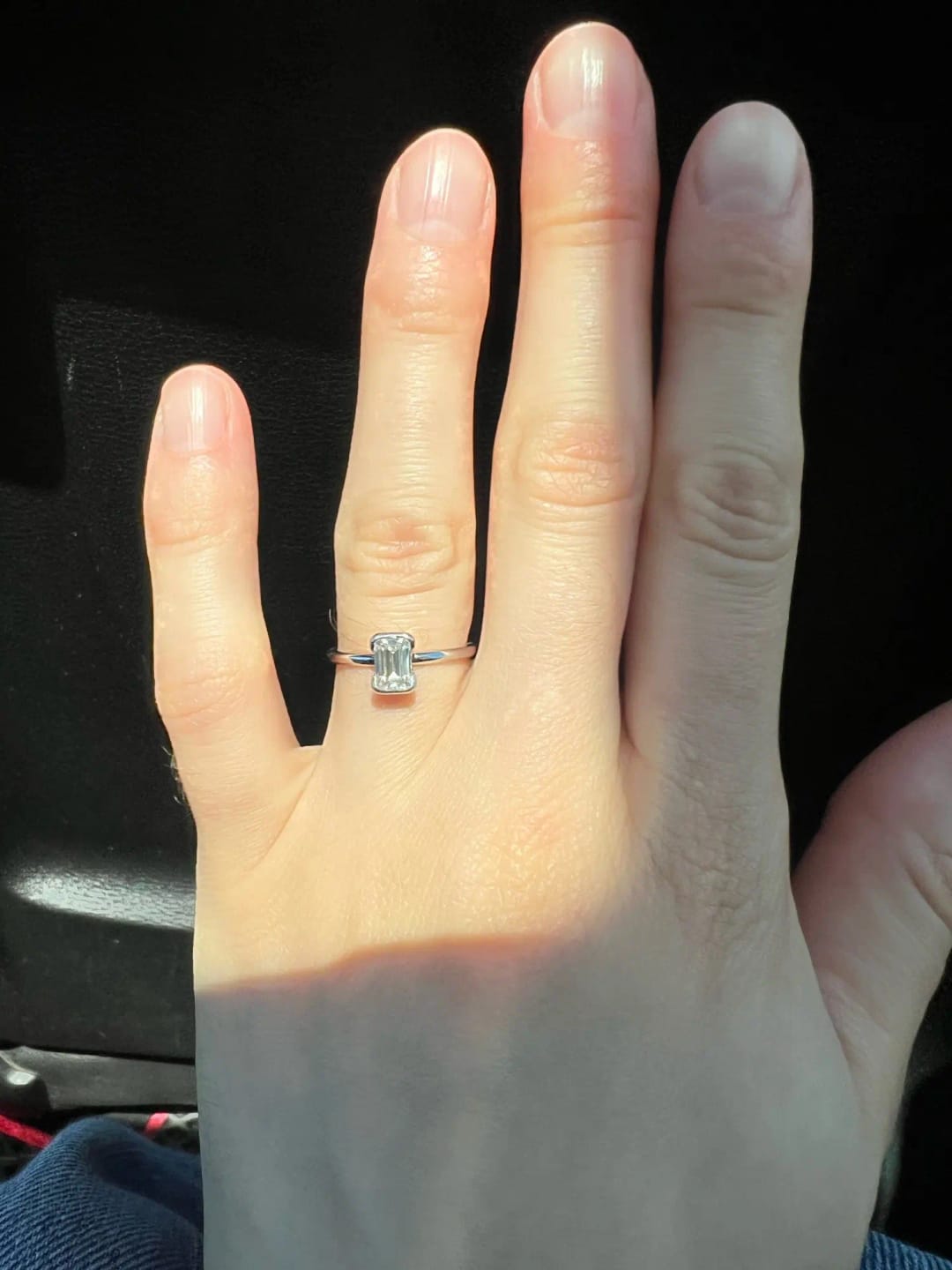 Customer photo review of Petite Emerald Cut Moissanite Ring