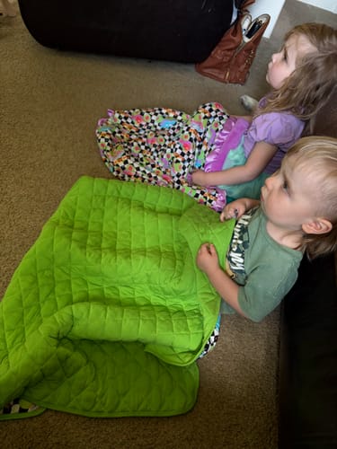 Customer photo review of Ready, Check, Glow Ruffle Bamboo Plush Blanket