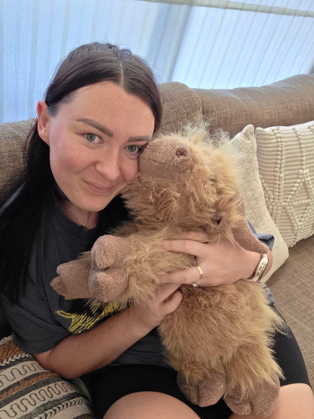 Customer photo review of Highland Cow Weighted Heated Plush