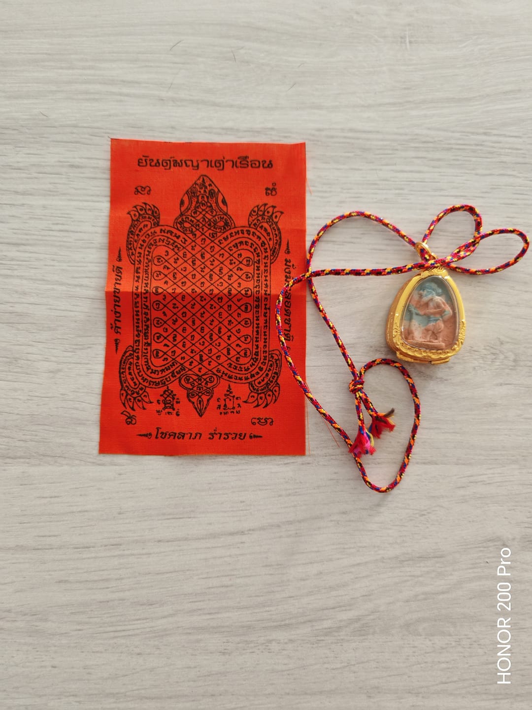 Customer photo review of Amulette de fortune Chuchok - Vénérable Phra Ajarn Deng. # 237