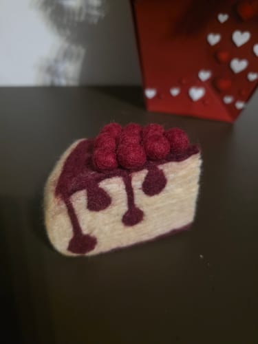 Customer photo review of Felt Boysenberry Cheesecake Slice