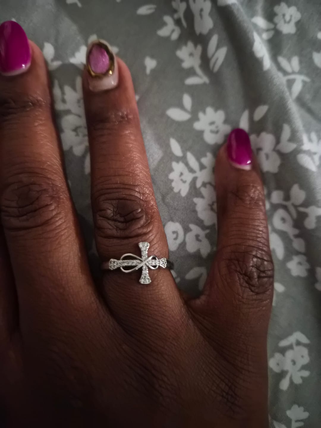 Customer photo review of Christianartworkshop Golden/Silver Mobius Cross Ring: Carry His Grace in Daily Wear