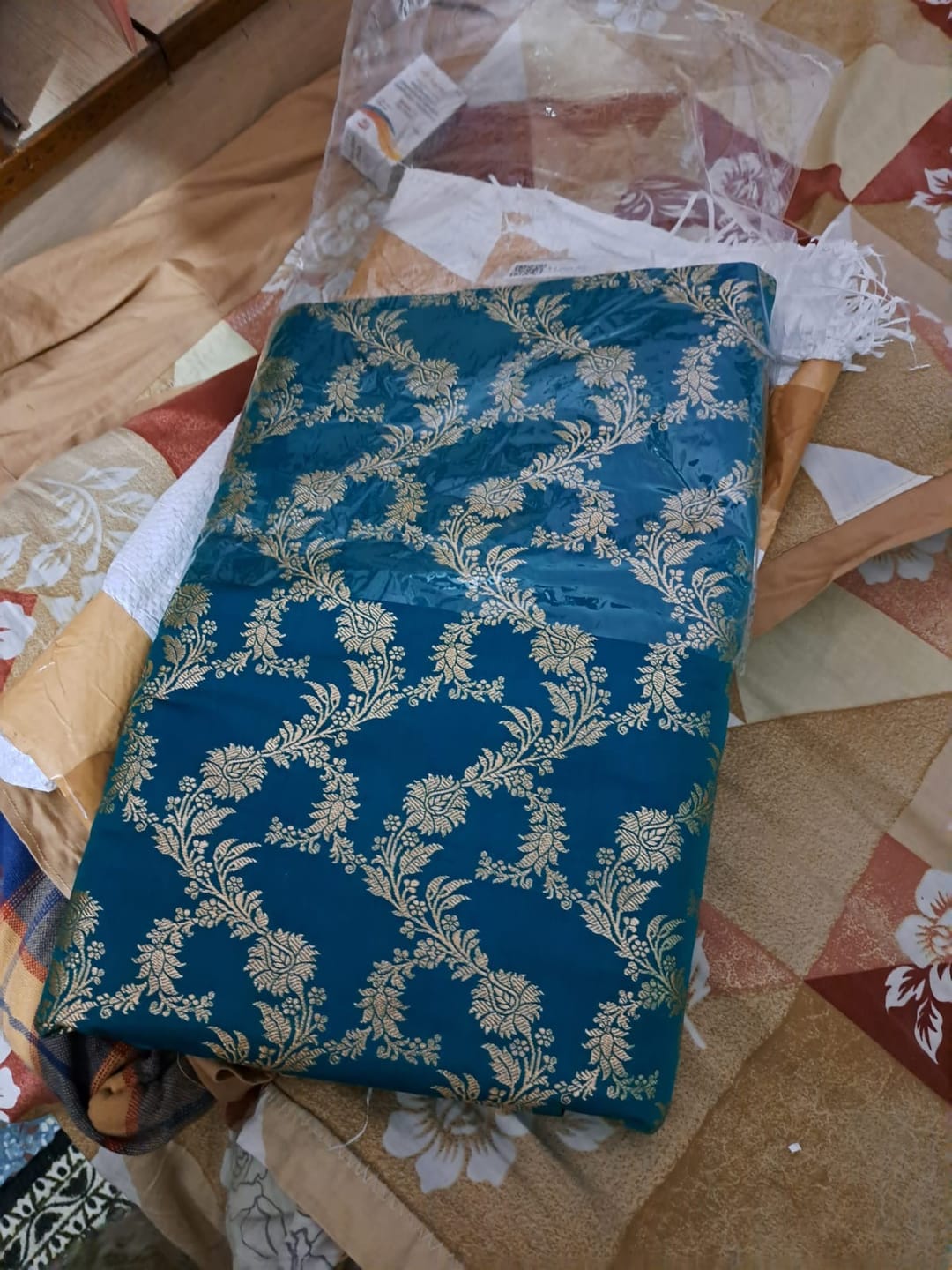 Customer photo review of Teal Moglai Jaal Katan Silk Banarasi Saree