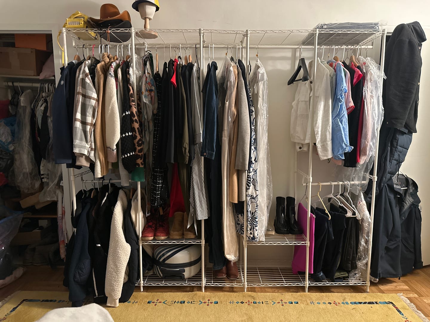 Customer photo review of Raybee 90.6''W Heavy Duty Clothes Rack with Cover,1200lbs Freestanding Garment Rack for Bedroom
