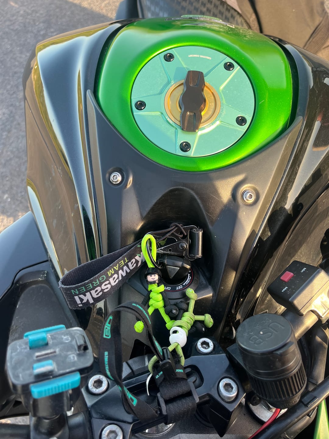 Customer photo review of Black Green Biker Buddy Paracord Keychain