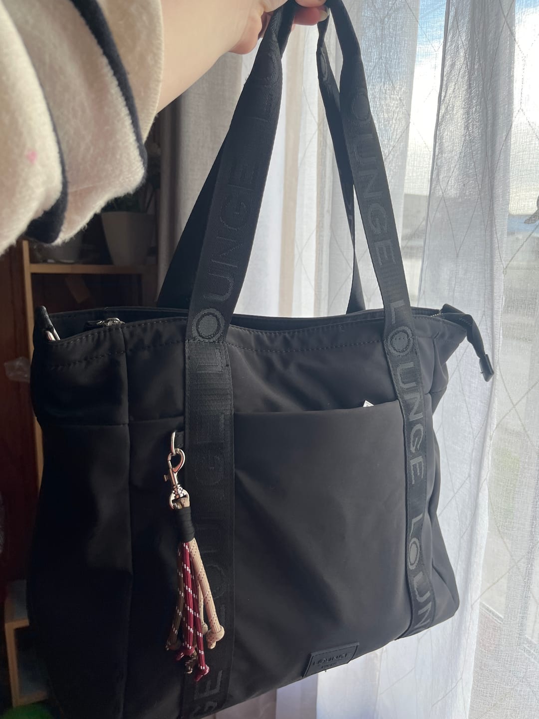Customer photo review of Bolso Nylon Llavero Street