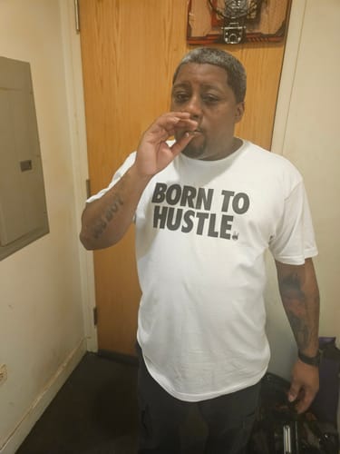 Customer photo review of BORN TO HUSTLE PREMIUM TEE