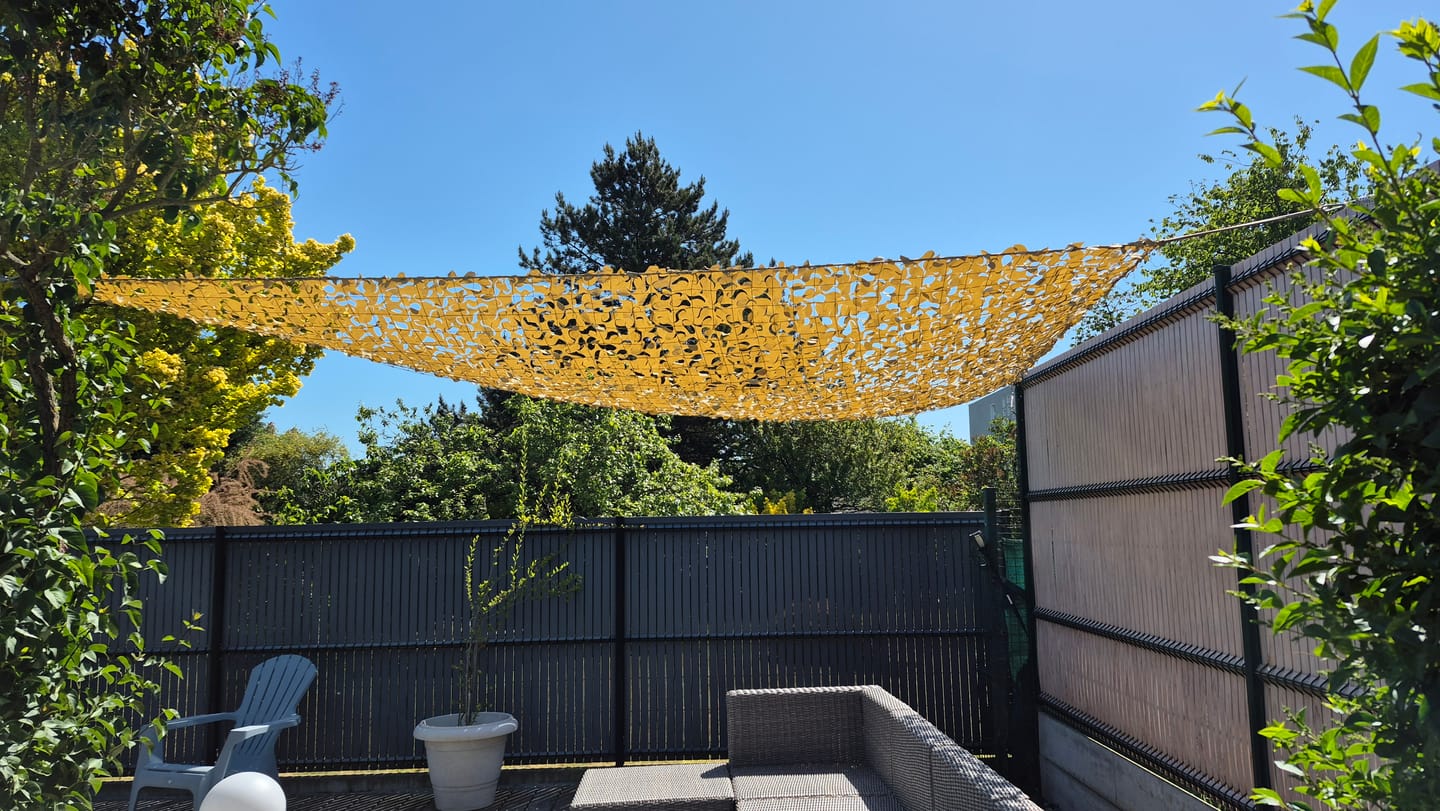 Customer photo review of Filet de camouflage triangulaire sable