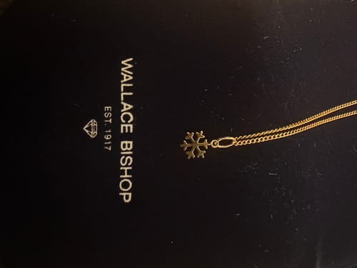 Customer photo review of Children's Snowflake Pendant in 9ct Yellow Gold
