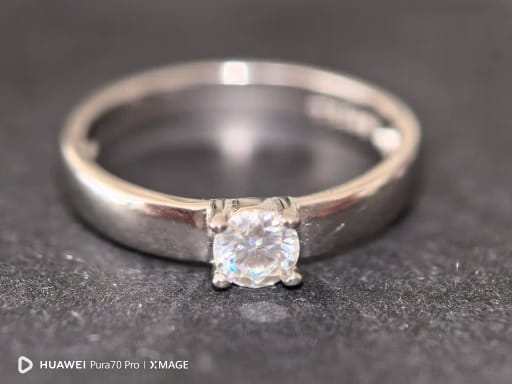 Customer photo review of Mini Round Cut Solitaire Moissanite Ring
