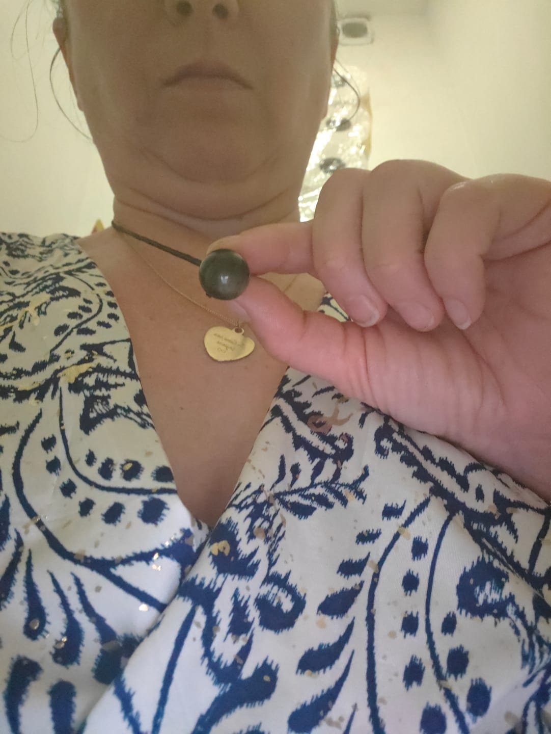 Customer photo review of Pendentif "Sphère" en Obsidienne Dorée