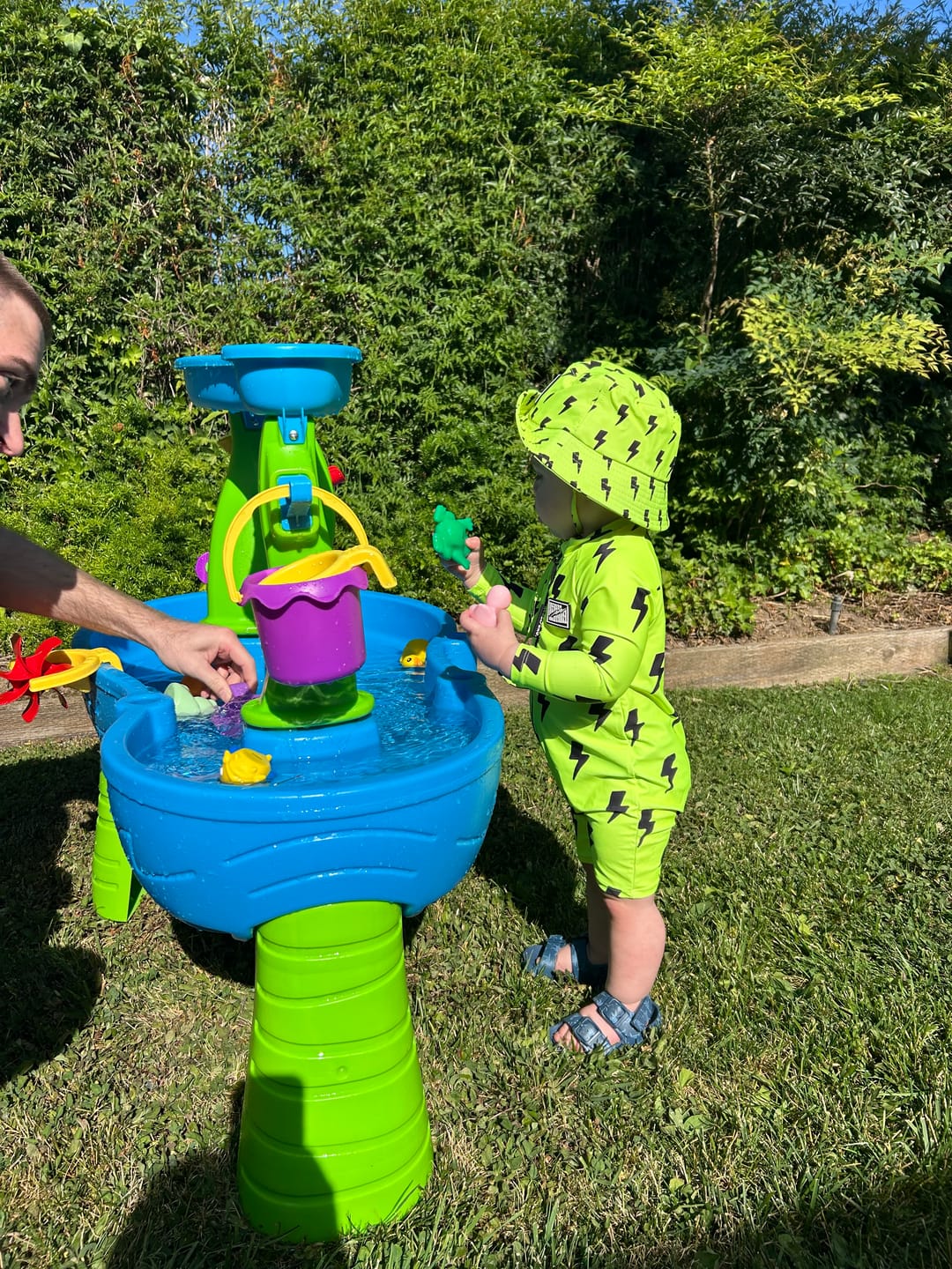 Customer photo review of UPF50+ Boys Swim Romper in Neon Electric Lime x Jagger