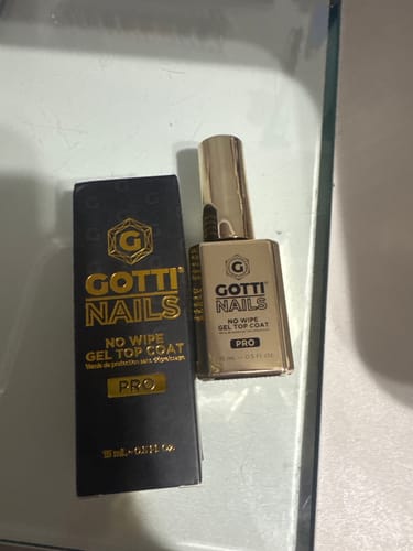Customer photo review of Gotti No Wipe Gel Top Coat - Super Slick - New and Improved Formula (GOLD BOTTLE)