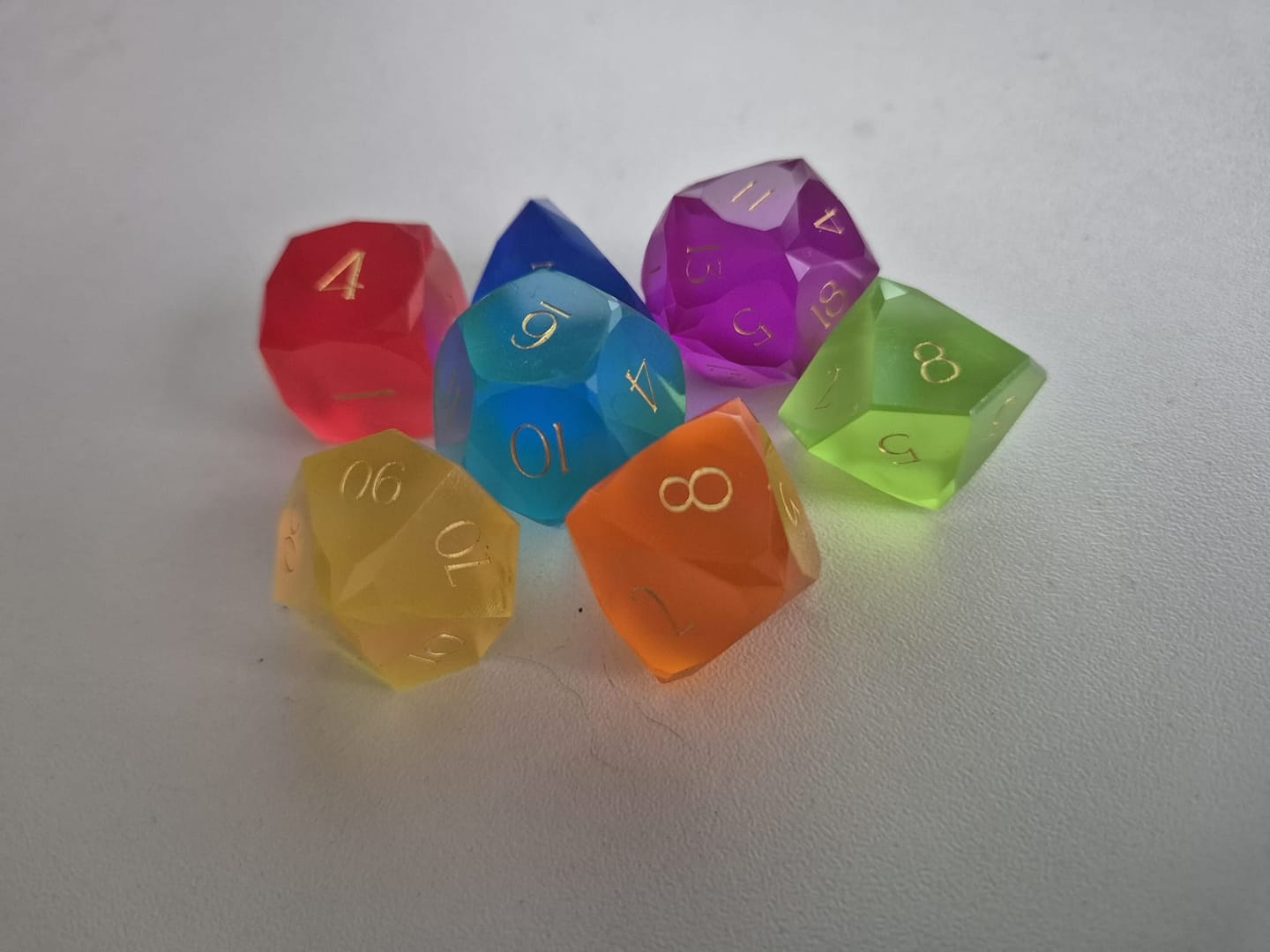 Customer photo review of URWizards D&D Resin Rainbow Candy Engraved Dice Set Multi-faceted Style