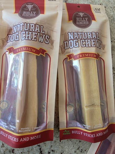 Customer shows two new packages of Himalayan Yak Chews in their sealed bags.