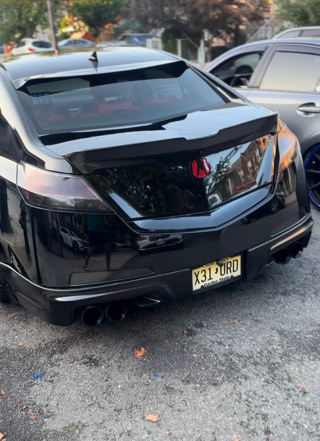 Customer photo review of 2009-2014 acura TL carbon fiber trunk spoiler.